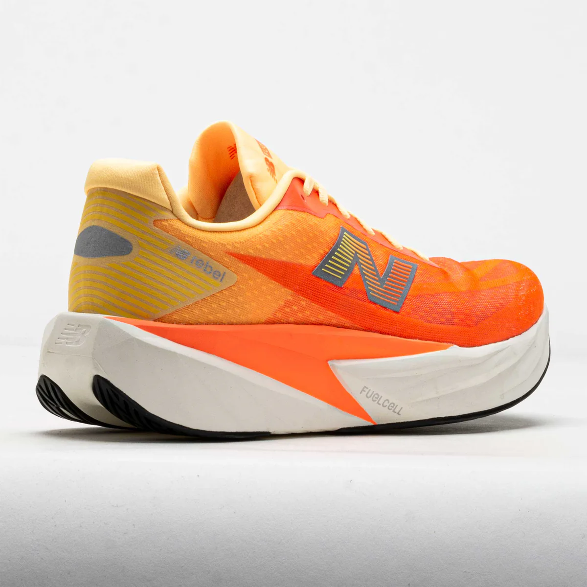 New Balance Men Rebel V5 - Tangerine Heat / Silver Metallic