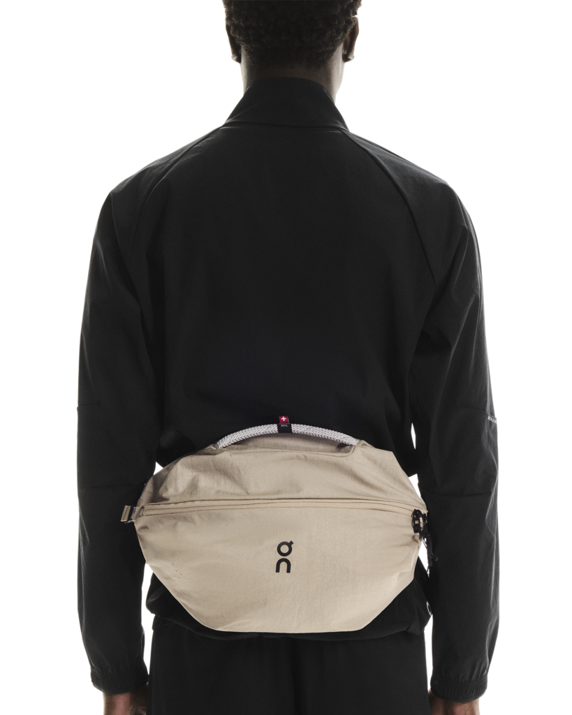 On Unisex Sling Pack 9L - Sand / Black