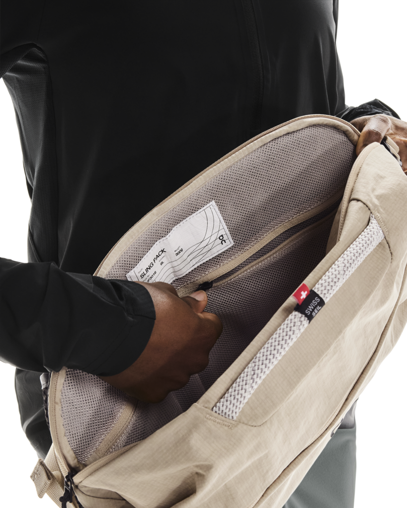 On Unisex Sling Pack 9L - Sand / Black