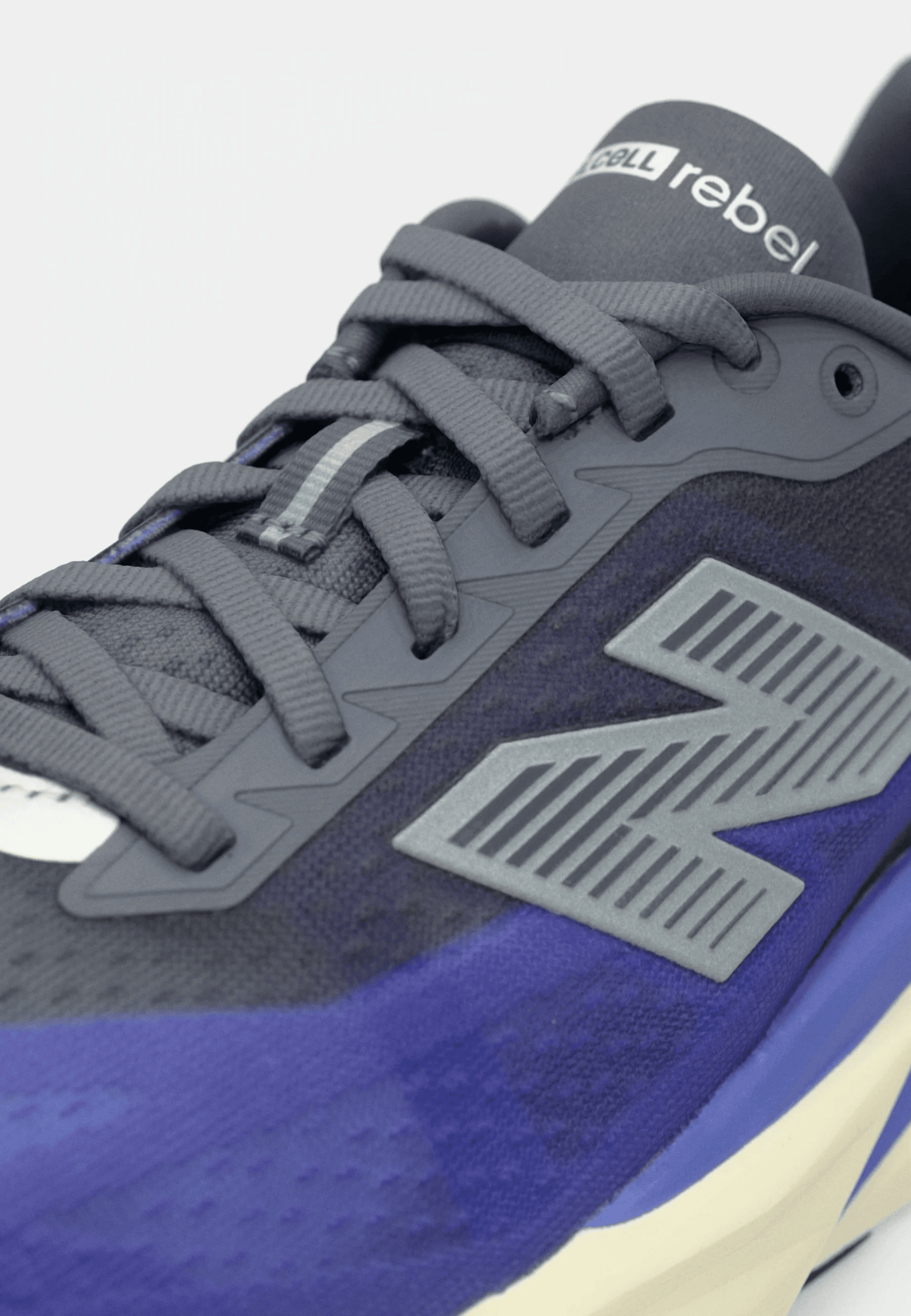 New Balance Men Rebel V5 - Electric Indigo / Truffle Salt / Silver Metallic