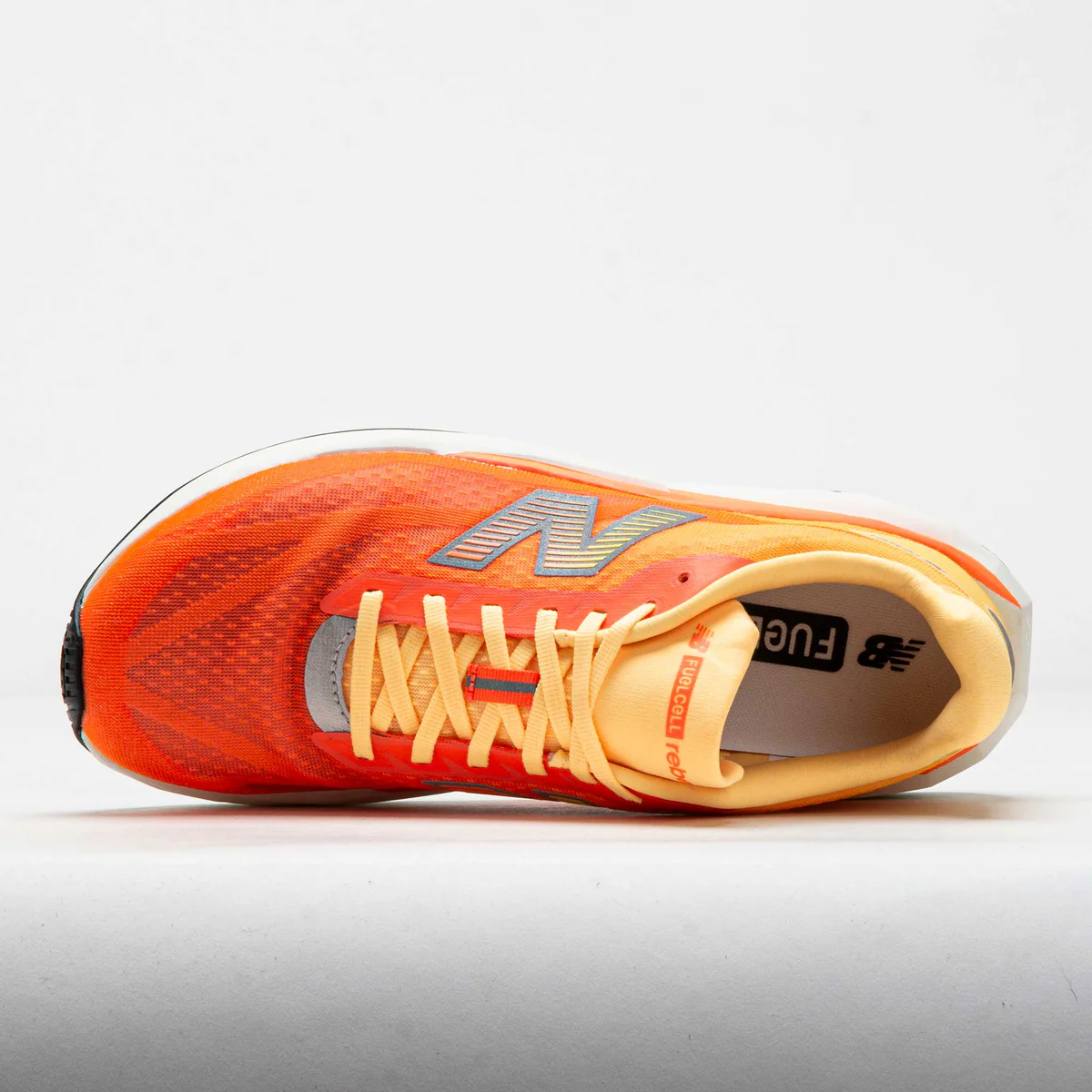 New Balance Men Rebel V5 - Tangerine Heat / Silver Metallic